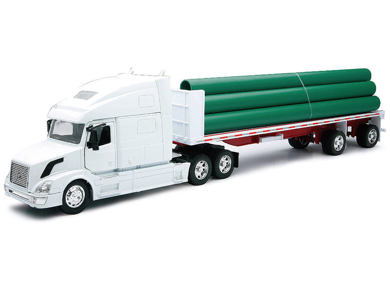 Volvo VN-780 Truck with Flatbed Trailer and Long Pipes White "Long Haul Truckers" Series 1/32 Diecast Model by New Ray