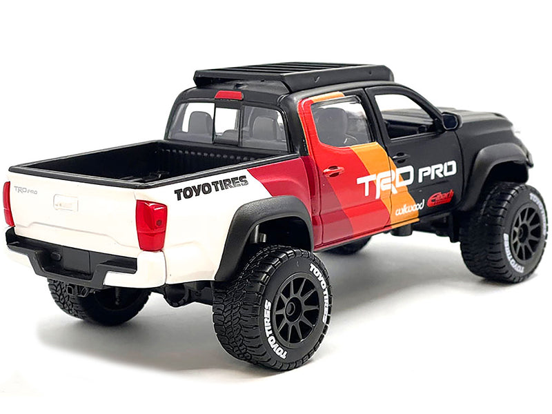 2023 Toyota Tacoma TRD PRO Off Road Pickup Truck Matt Black with Graphics and Roofrack "Maisto Design" Series 1/27 Diecast Model Car by Maisto