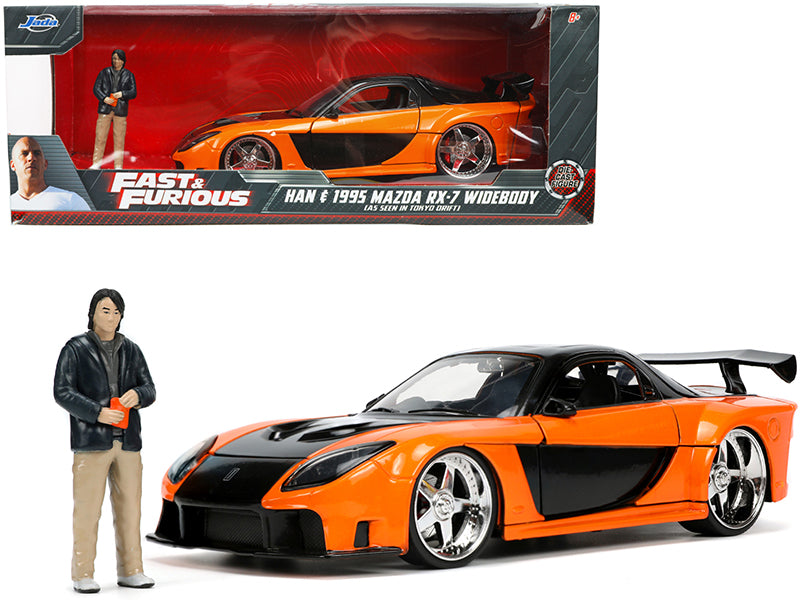 1995 Mazda RX-7 Widebody RHD (Right Hand Drive) Orange Metallic and Black with Han Diecast Figurine "The Fast and the Furious: Tokyo Drift" (2006) Movie 1/24 Diecast Model Car by Jada