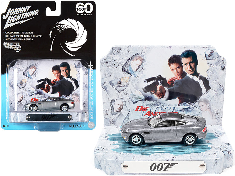 2002 Aston Martin V12 Vanquish Tungsten Silver Metallic with Collectible Tin Display "007" (James Bond) "Die Another Day" (2002) Movie "60 Years Of Bond" 1/64 Diecast Model Car by Johnny Lightning