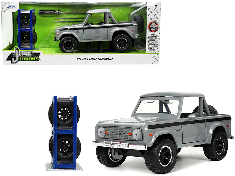 1973 Ford Bronco Pickup Truck Gray with Black Stripes with Extra Wheels "Just Trucks" Series 1/24 Diecast Model Car by Jada