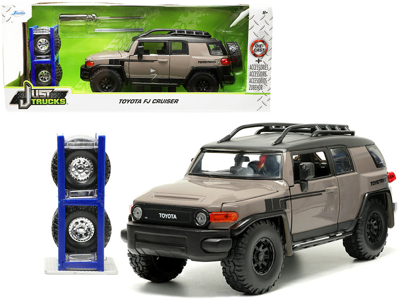 Toyota FJ Cruiser with Roof Rack Brown and Black "Toyo Tires" with Extra Wheels "Just Trucks" Series 1/24 Diecast Model Car by Jada