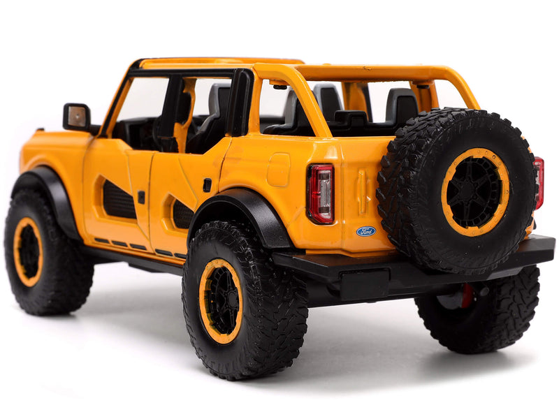 2021 Ford Bronco Orange Metallic with Extra Wheels "Just Trucks" Series 1/24 Diecast Model Car by Jada