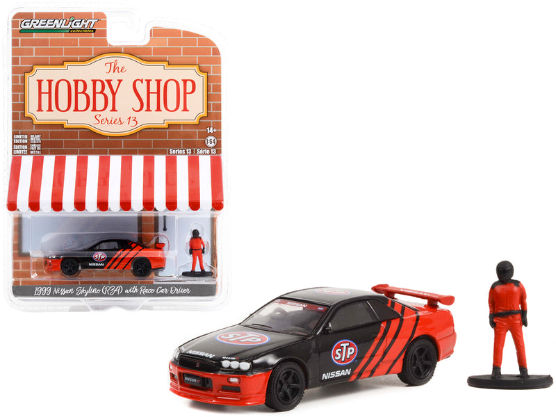 1999 Nissan Skyline (R34) RHD (Right Hand Drive) Black and Red "STP" and Race Car Driver Figure "The Hobby Shop" Series 13 1/64 Diecast Model Car by Greenlight