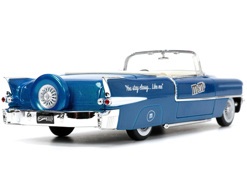 1956 Cadillac Eldorado Convertible Blue Metallic with Cream Interior "Stay Classy" and Blue M&M Diecast Figure "M&M's" "Hollywood Rides" Series 1/24 Diecast Model Car by Jada