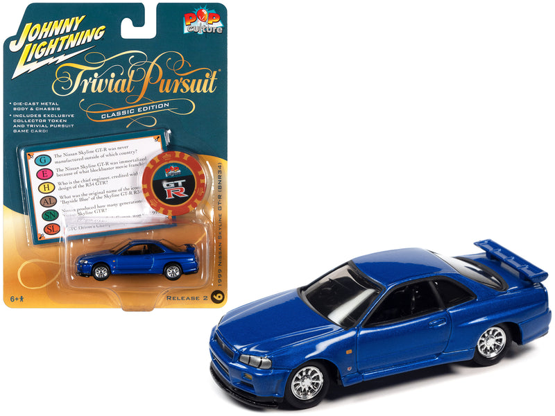 1999 Nissan Skyline GT-R RHD (Right Hand Drive) Blue Metallic with Poker Chip Collector's Token and Game Card "Trivial Pursuit" "Pop Culture" 2022 Release 2 1/64 Diecast Model Car by Johnny Lightning