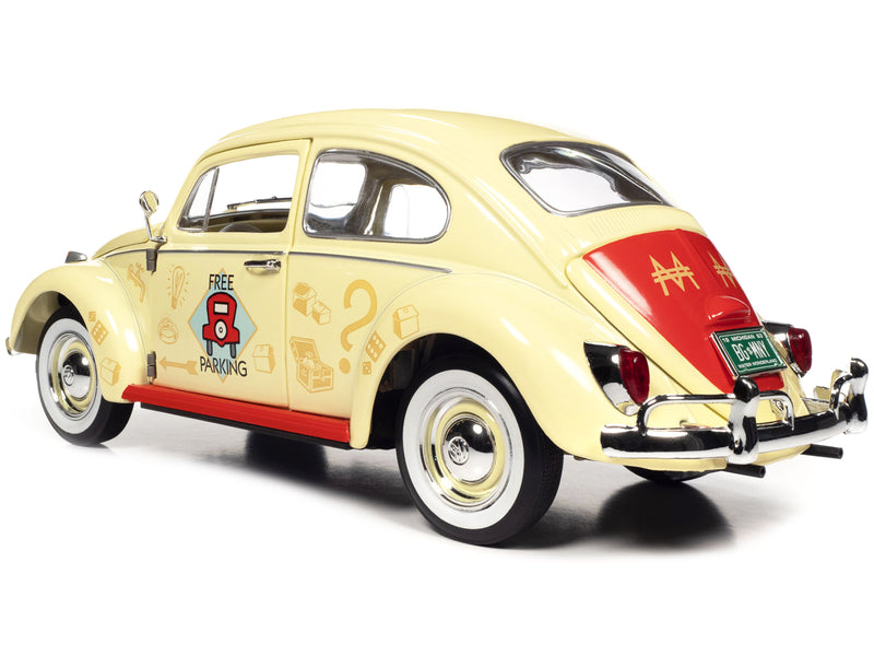 1963 Volkswagen Beetle Yukon Yellow with "Monopoly" Graphics "Free Parking" and Mr. Monopoly Resin Figure 1/18 Diecast Model Car by Auto World